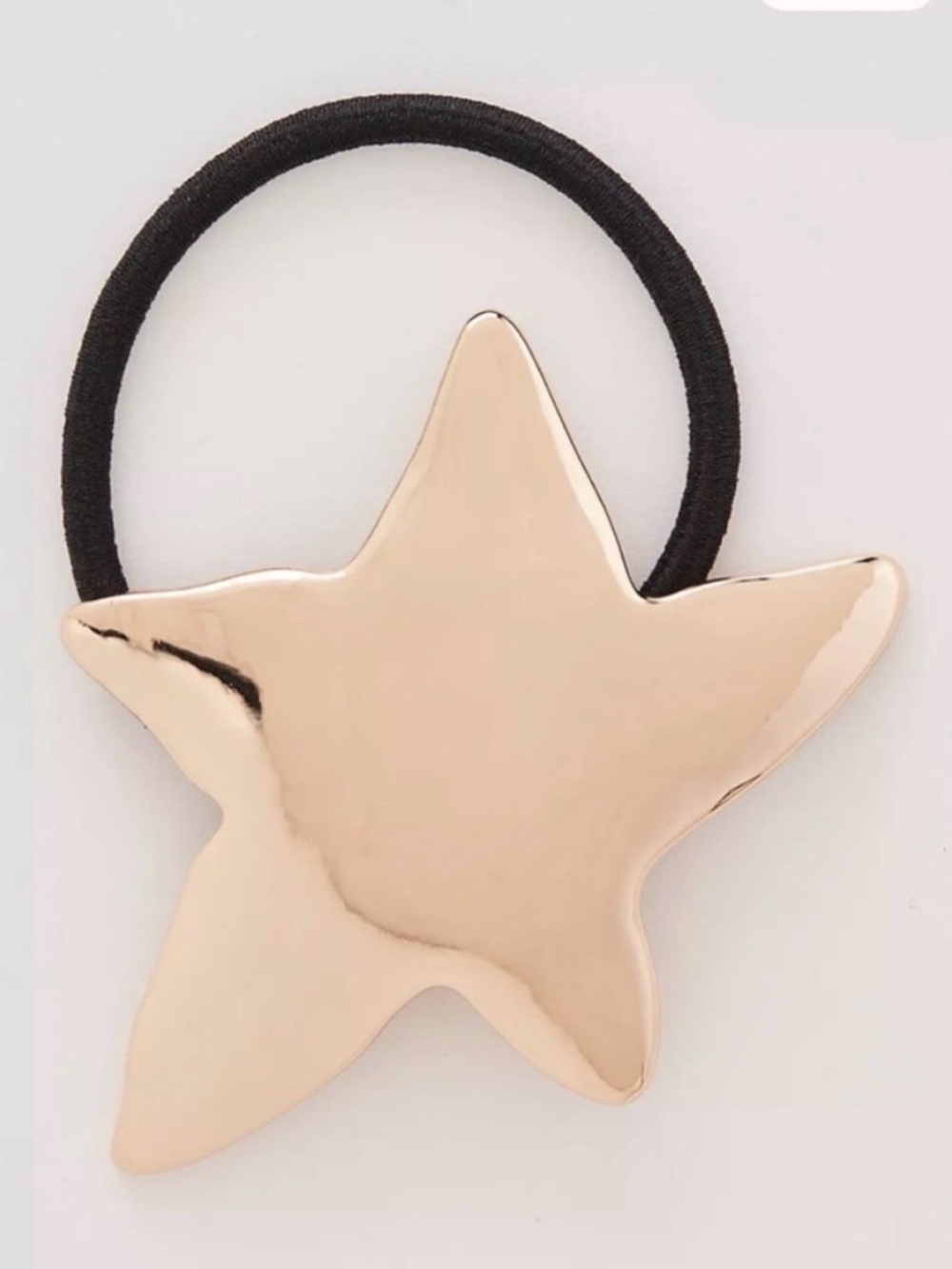 Free people Written In The Stars Pony. NWT star gold